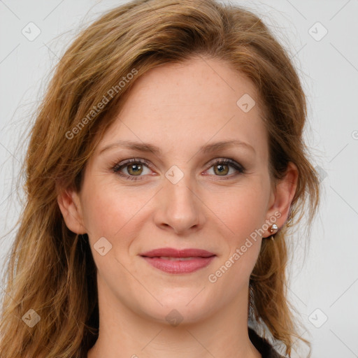 Joyful white young-adult female with long  brown hair and green eyes