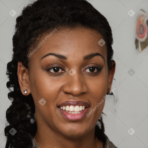 Joyful black young-adult female with long  brown hair and brown eyes