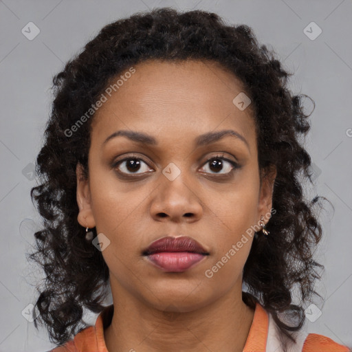 Neutral black young-adult female with medium  brown hair and brown eyes