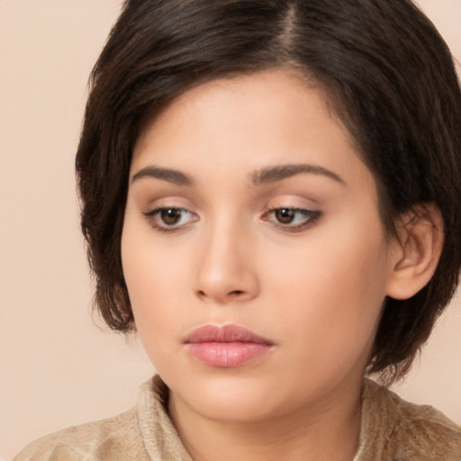 Neutral white young-adult female with long  brown hair and brown eyes