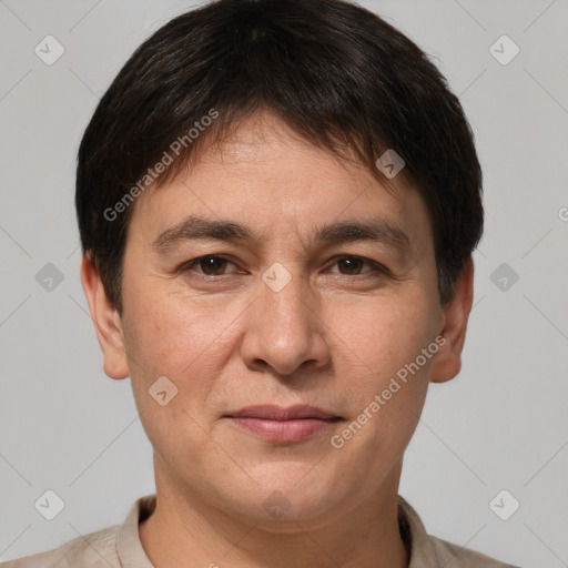 Joyful white adult male with short  brown hair and brown eyes