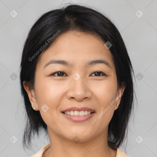 Joyful asian young-adult female with medium  brown hair and brown eyes