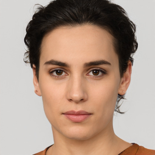 Neutral white young-adult female with short  brown hair and brown eyes