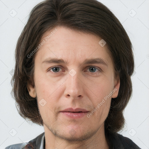 Joyful white adult male with medium  brown hair and grey eyes