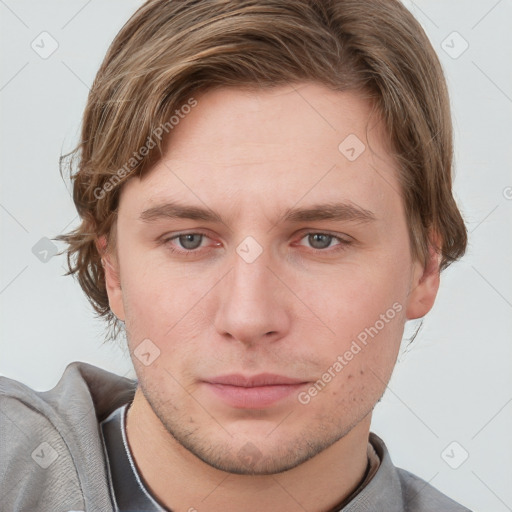 Neutral white young-adult male with short  brown hair and grey eyes