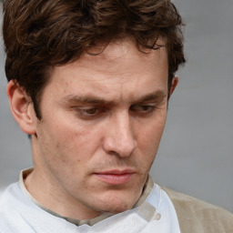 Neutral white adult male with short  brown hair and brown eyes