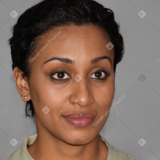 Joyful black young-adult female with short  brown hair and brown eyes