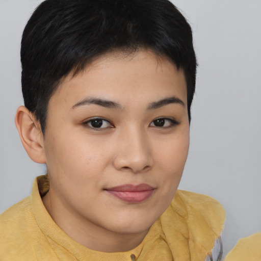 Joyful asian young-adult female with short  brown hair and brown eyes