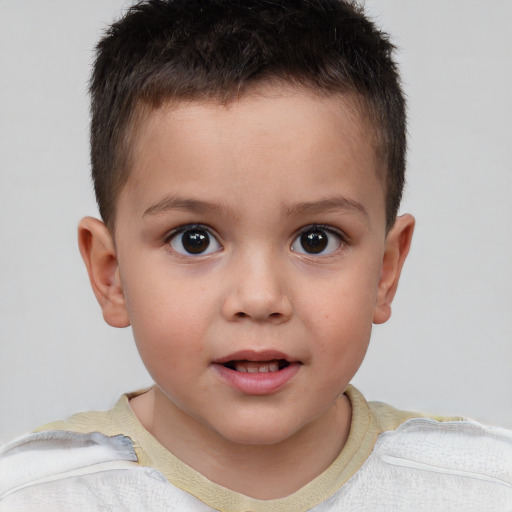 Joyful white child male with short  brown hair and brown eyes