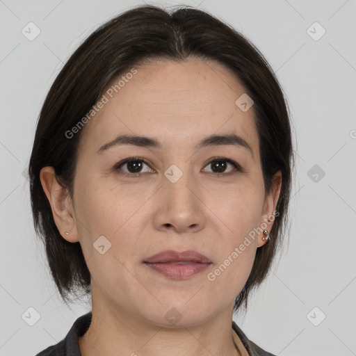 Joyful white adult female with medium  brown hair and brown eyes