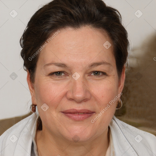 Joyful white adult female with short  brown hair and brown eyes