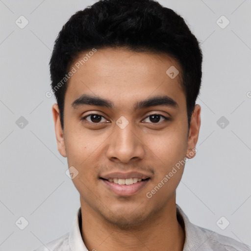 Joyful latino young-adult male with short  black hair and brown eyes