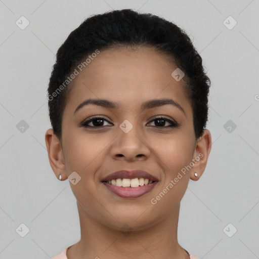 Joyful latino young-adult female with short  brown hair and brown eyes