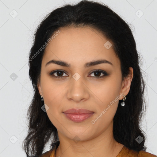 Joyful latino young-adult female with long  brown hair and brown eyes