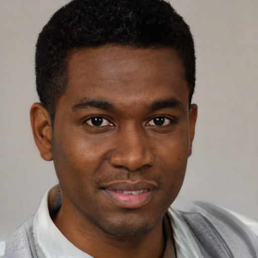 Neutral black young-adult male with short  brown hair and brown eyes