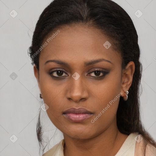 Neutral black young-adult female with long  brown hair and brown eyes