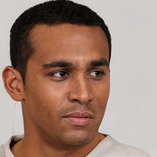 Neutral latino young-adult male with short  brown hair and brown eyes