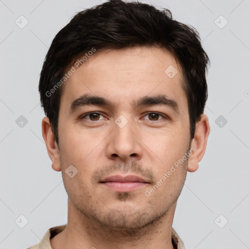Neutral white young-adult male with short  brown hair and brown eyes