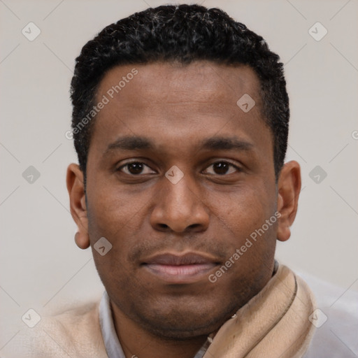 Neutral black young-adult male with short  black hair and brown eyes