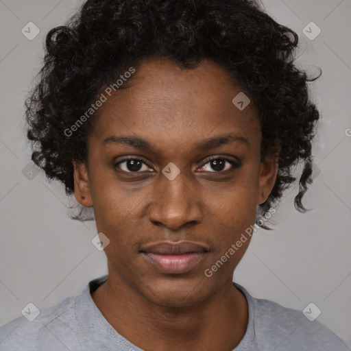 Neutral black young-adult female with short  brown hair and brown eyes