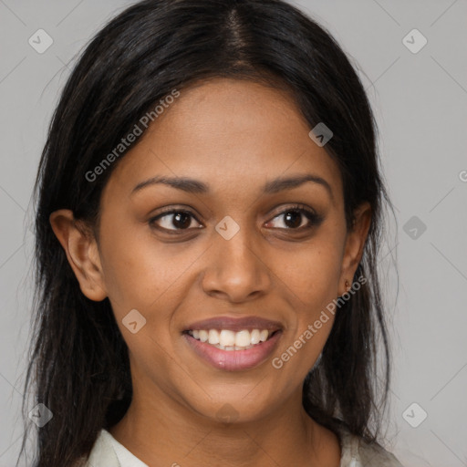 Joyful black young-adult female with medium  brown hair and brown eyes