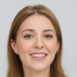 Joyful white young-adult female with long  brown hair and grey eyes