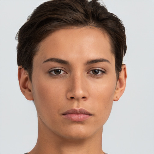 Neutral white young-adult female with short  brown hair and brown eyes