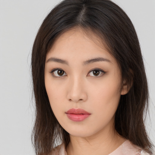 Neutral asian young-adult female with long  brown hair and brown eyes