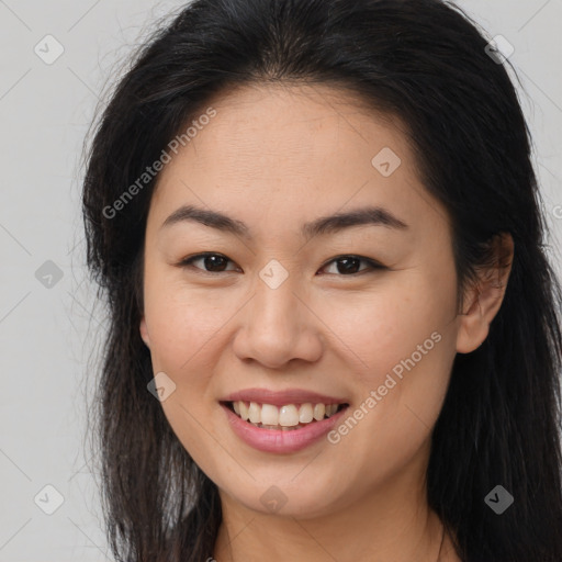 Joyful white young-adult female with long  brown hair and brown eyes