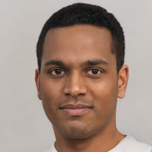 Neutral black young-adult male with short  black hair and brown eyes