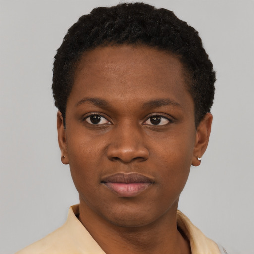 Joyful latino young-adult female with short  black hair and brown eyes