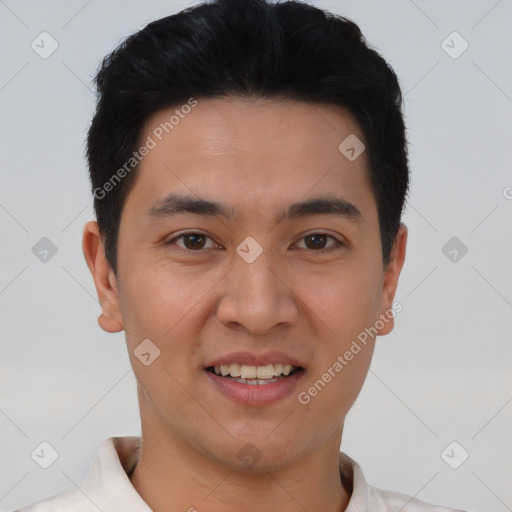 Joyful asian young-adult male with short  black hair and brown eyes