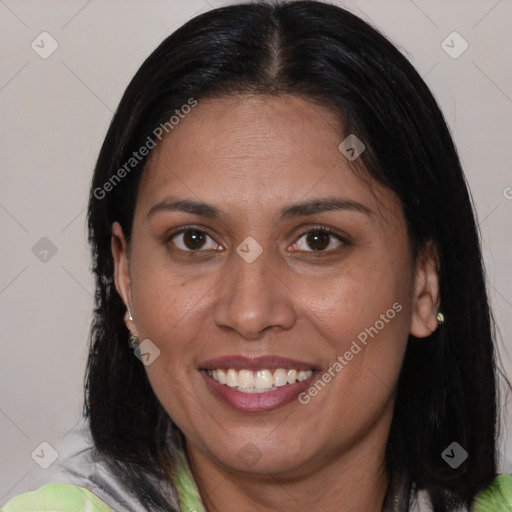 Joyful asian adult female with medium  brown hair and brown eyes