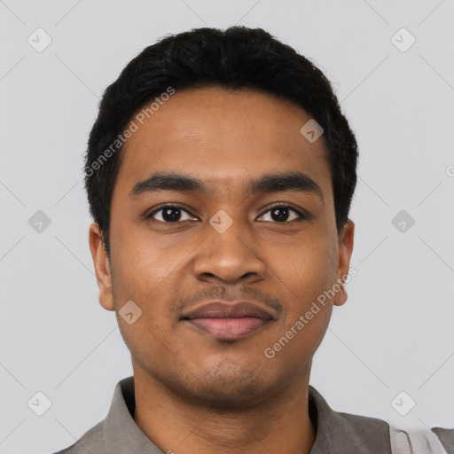 Joyful latino young-adult male with short  black hair and brown eyes
