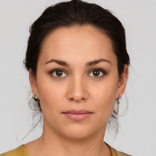 Neutral white young-adult female with medium  brown hair and brown eyes