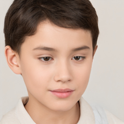 Joyful white child male with short  brown hair and brown eyes