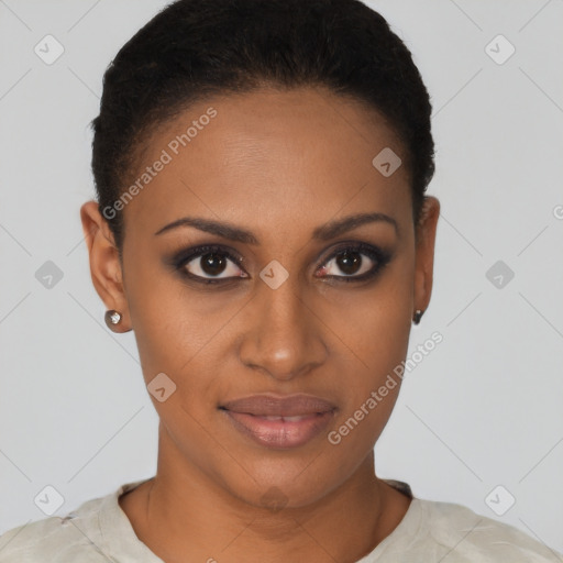 Joyful black young-adult female with short  brown hair and brown eyes