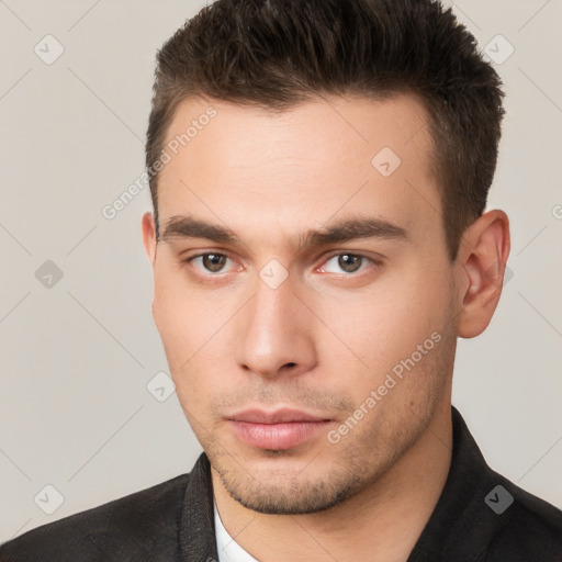 Neutral white young-adult male with short  brown hair and brown eyes