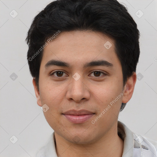 Joyful white young-adult male with short  black hair and brown eyes