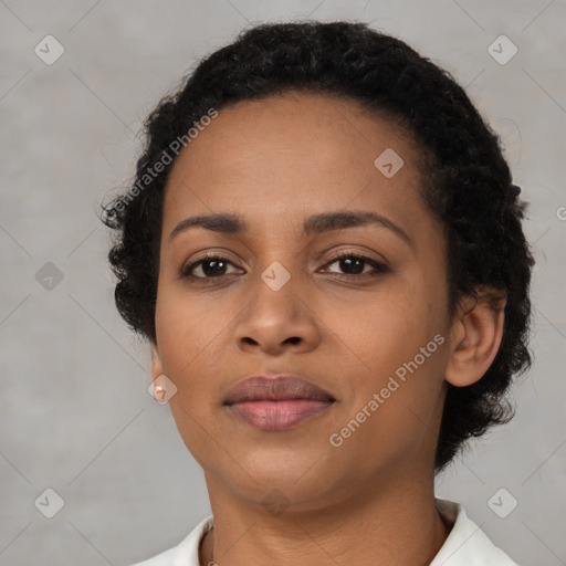 Joyful latino young-adult female with short  black hair and brown eyes