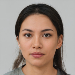 Neutral asian young-adult female with medium  brown hair and brown eyes