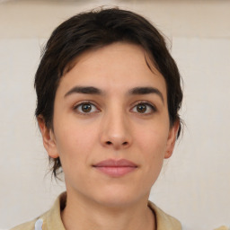 Neutral white young-adult female with short  brown hair and brown eyes