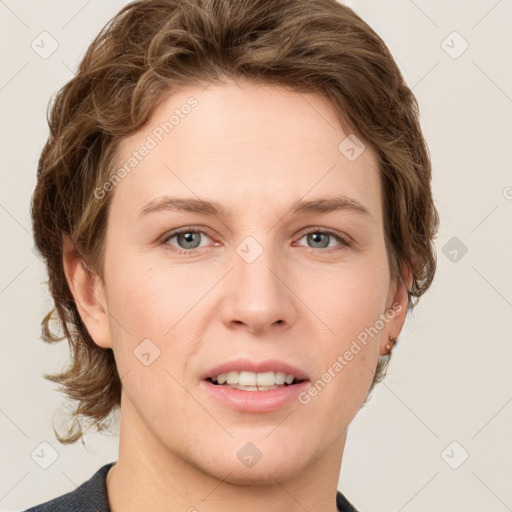 Joyful white young-adult female with short  brown hair and grey eyes