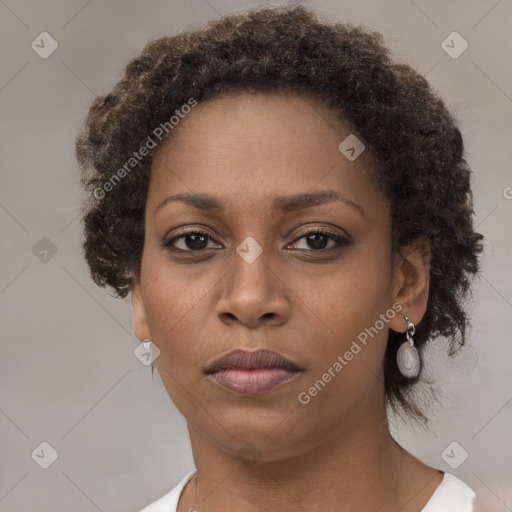 Neutral black young-adult female with short  brown hair and brown eyes