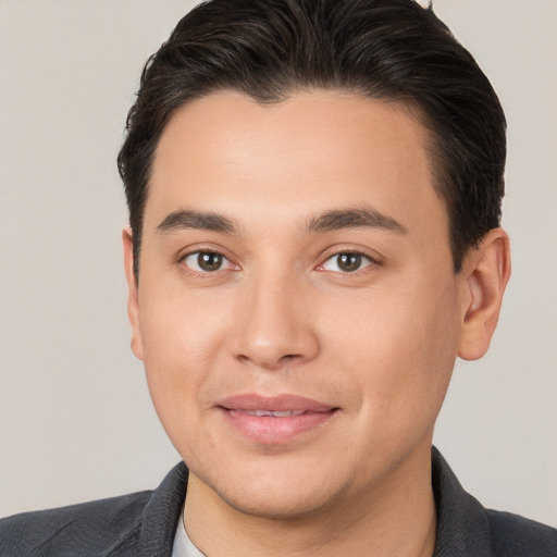 Joyful white young-adult male with short  brown hair and brown eyes