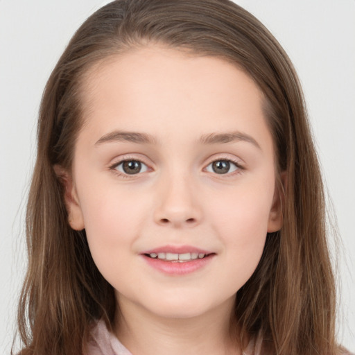 Joyful white child female with long  brown hair and brown eyes