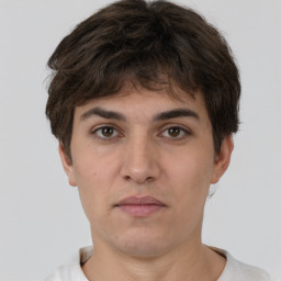 Neutral white adult male with short  brown hair and brown eyes