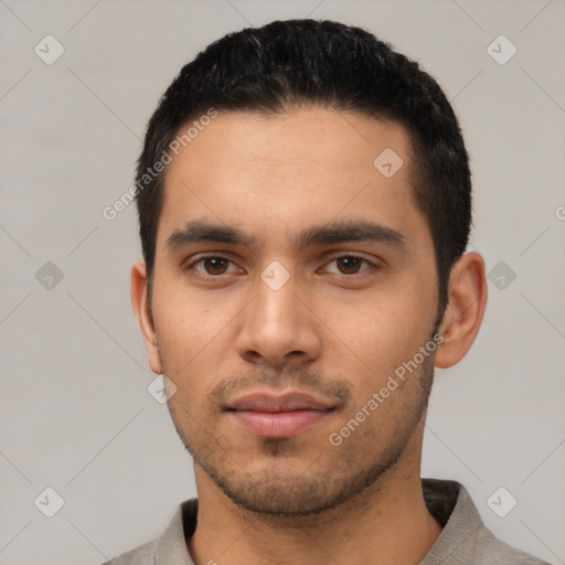 Neutral latino young-adult male with short  black hair and brown eyes