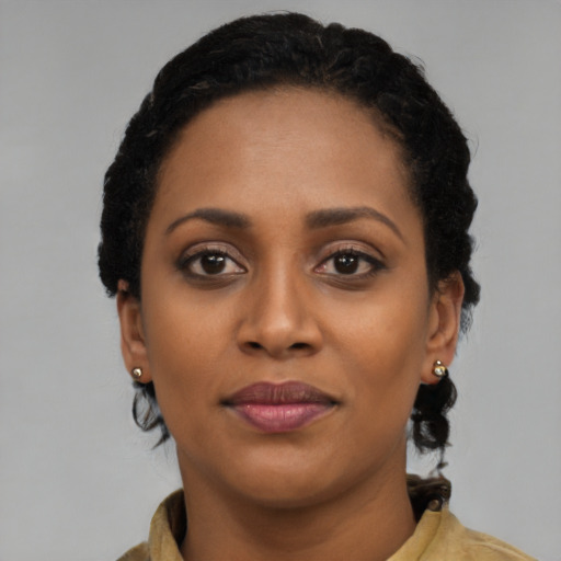Neutral black young-adult female with long  black hair and brown eyes