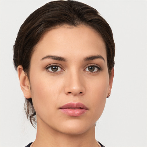 Neutral white young-adult female with short  brown hair and brown eyes